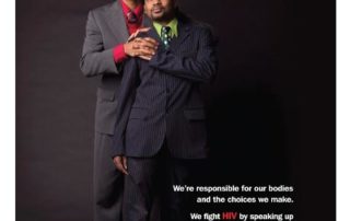 Gay couple dressed in suit and hat. caption talks about the importance of aids testing
